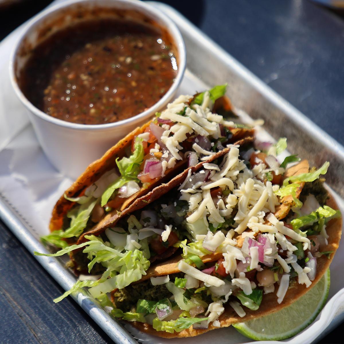 Tacos and beer makes happy hour . happy